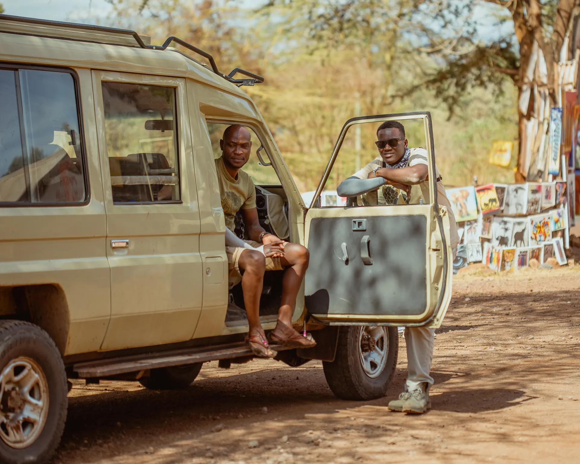 Safari vehicle travelling through a Tanzania wildlife area